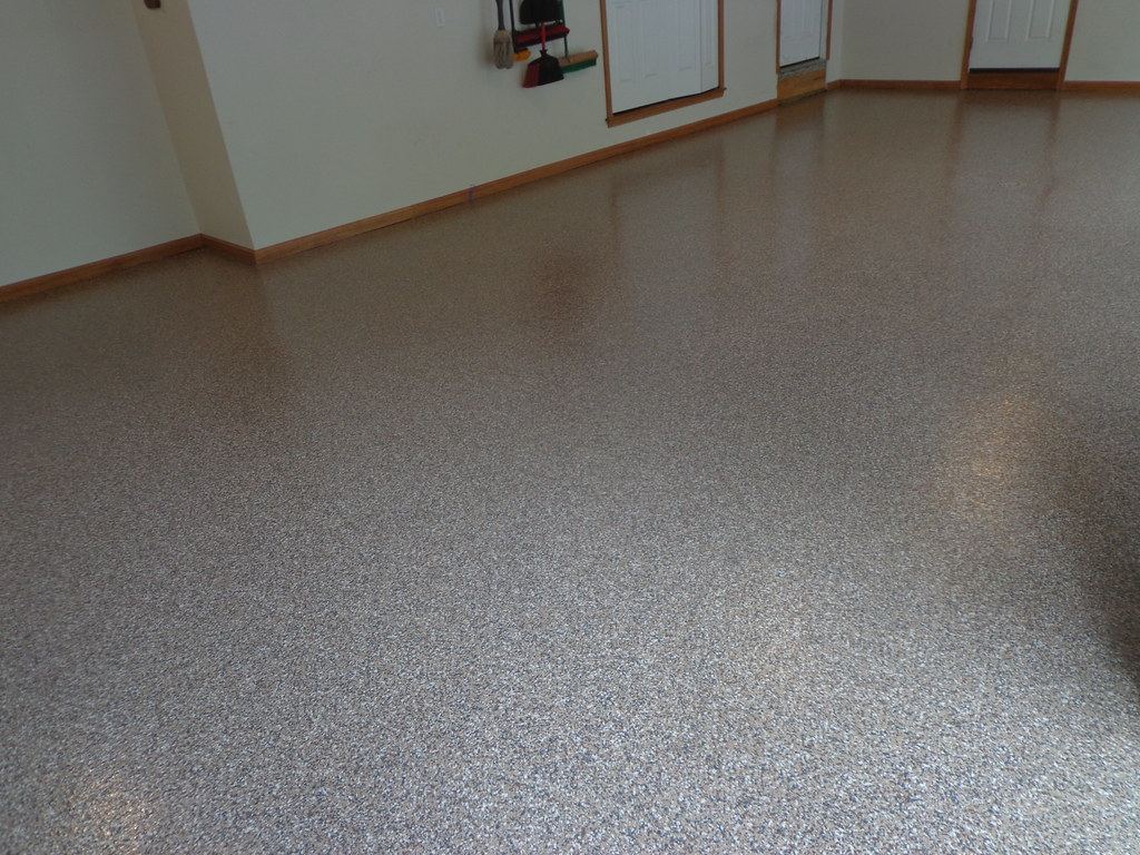 Resurfaced garage floor with flake epoxy